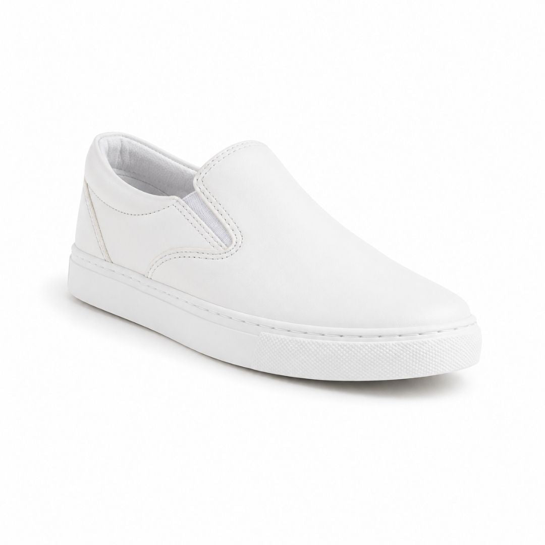 A clean white slip-on sneaker with a smooth leather upper, elastic side panel, and matching white sole, photographed on a seamless white background.